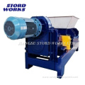 Animal waste feed processing grinder